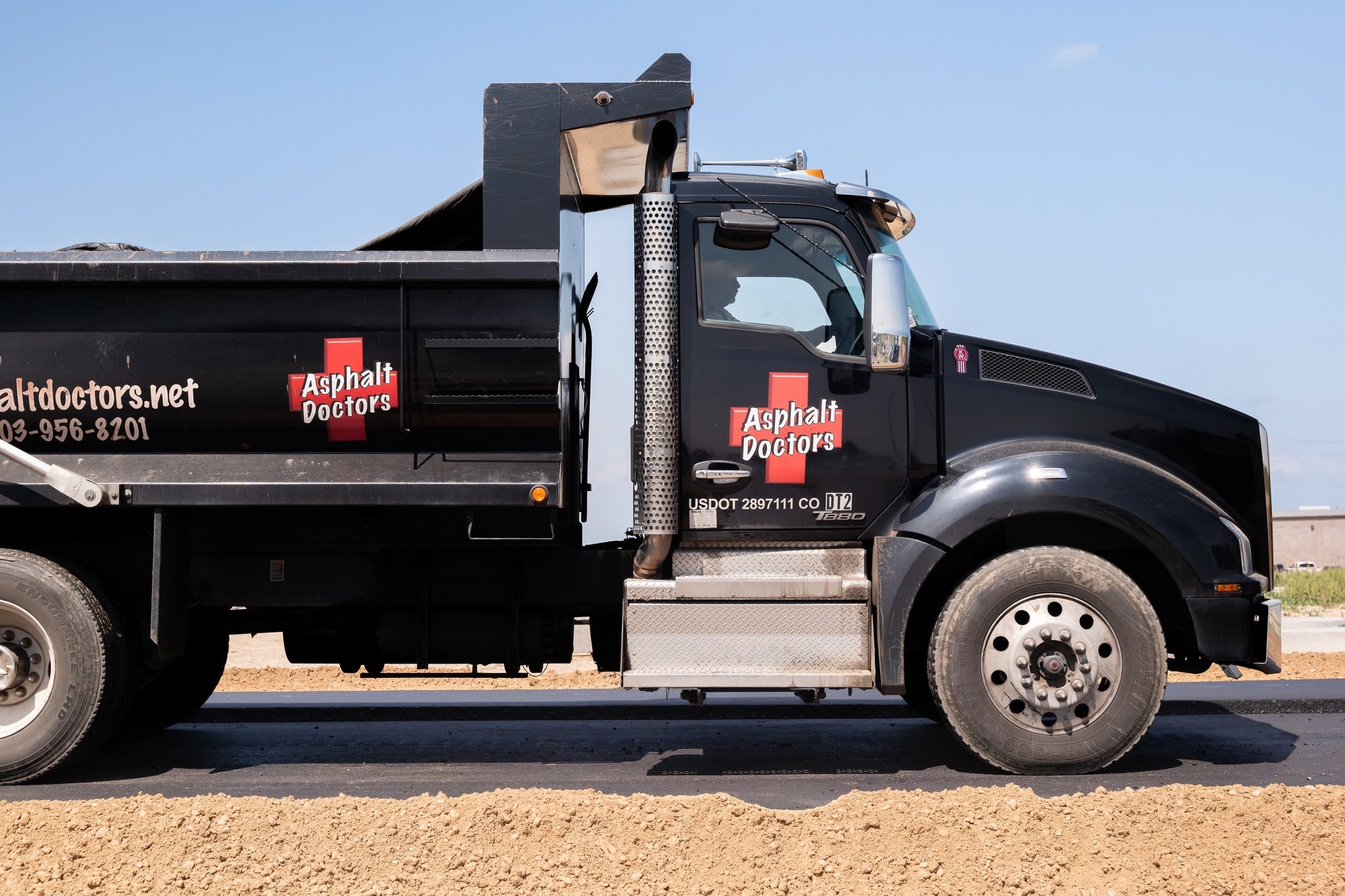 asphalt truck with branding for asphalt doctors